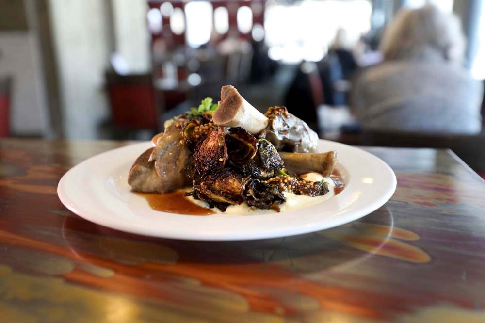 RUTH BONNEVILLE / WINNIPEG FREE PRESS
Coffee braised lamb shank, parsnip puree, date mustard and coffee lamb juice at Prairie’s Edge in Kildonan Park.