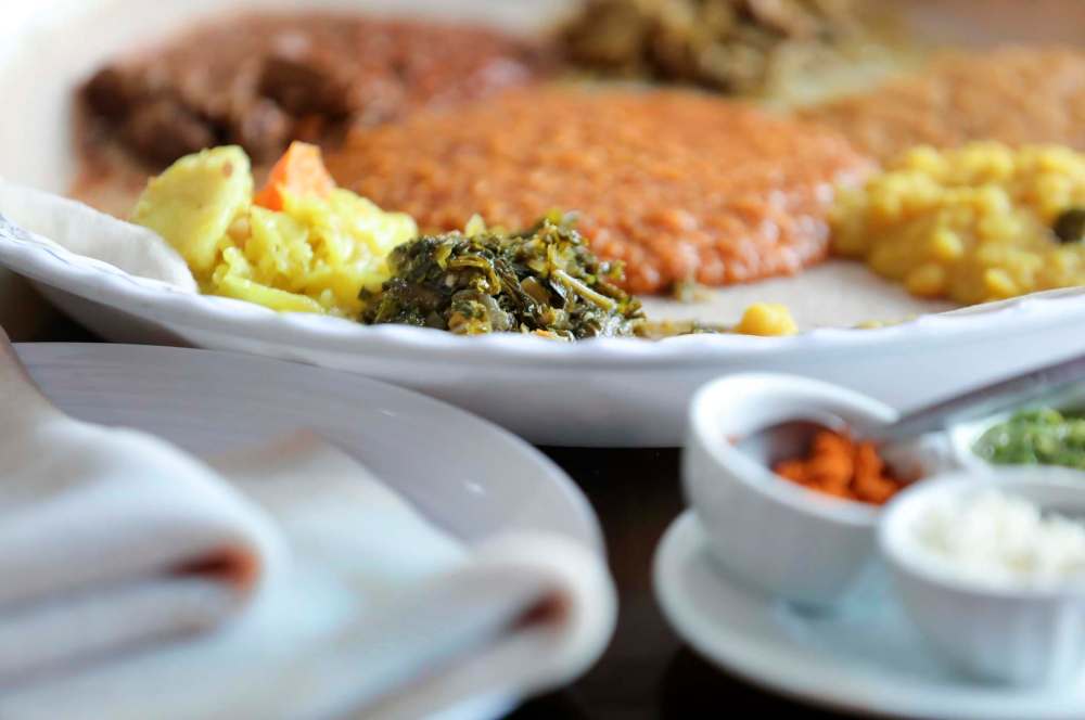 Desta Worku Negatu enrolled in a nursing program at Red River College when she first moved to Winnipeg, but now serves up Ethiopian food at her own restaurant. (Ruth Bonneville/Winnipeg Free Press)