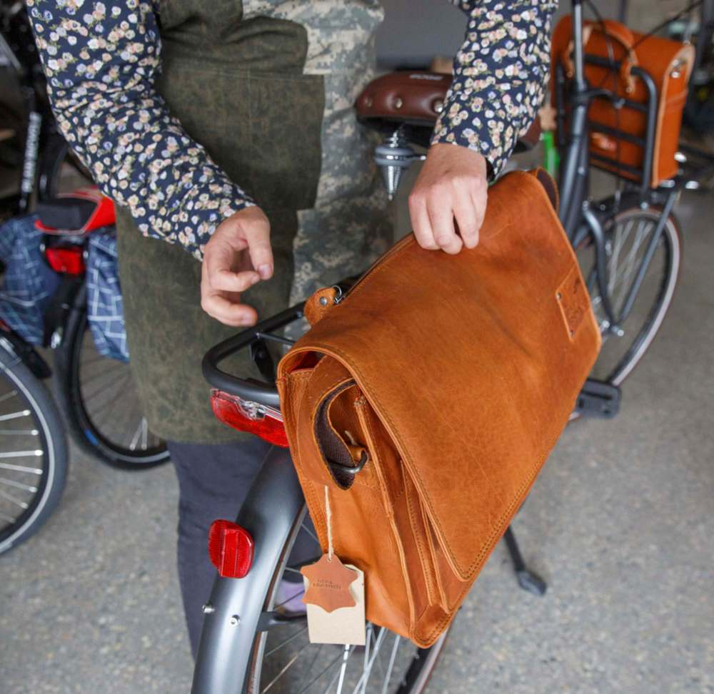 The Bicycle Garden has leather pannier bags for sale. (Mike Deal / Winnipeg Free Press)