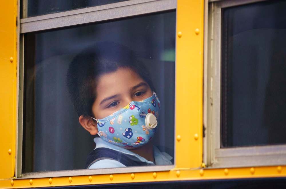 Manitoba has amended its policy, mandating even the youngest students wear face coverings to minimize spread of the coronavirus. (Paul Chiasson / The Canadian Press)