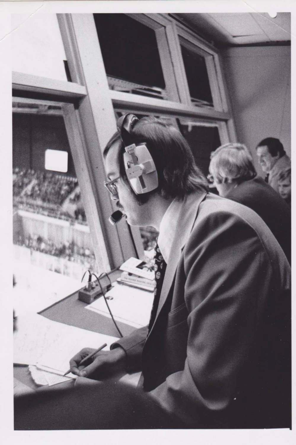 Supplied
Bob Irving behind the microphone at a hockey game in 1976. Irving first started calling games in the early 1970s in Brandon.