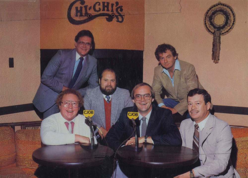 Irving (centre) and his old CJOB 680 crew.