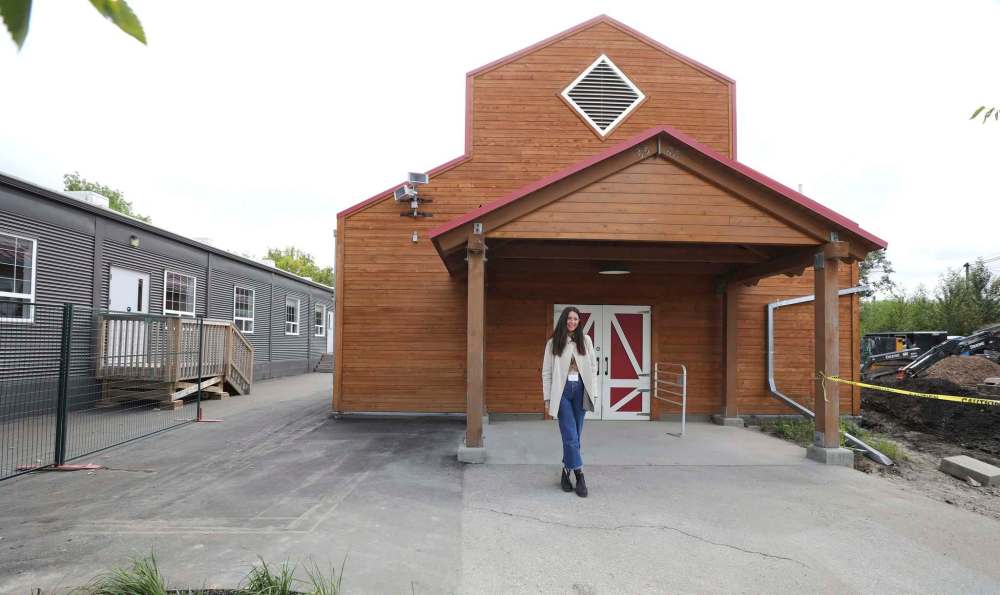 RUTH BONNEVILLE / WINNIPEG FREE PRESS
LOCAL - New Aunt Sally's Farm at the Zoo
A press conference was held at the Zoo announcing the return of beloved exhibit to Assiniboine Park Zoo - New Aunt Sally's Farm, on Tuesday.
Photo of Micah Sifton LeLeune, in front of the Carolyn Sifton Foundation Barn. Micah Sifton LaLeune took part in the presser and tour on behalf of her family foundation, whose gift of $1 million will be recognized with the renaming of the Carolyn Sifton Foundation Barn.
Assiniboine Park Conservancy COO, Bruce Keats (blue suit), spoke to the media before walking through the beginning stages of the construction of the exhibit which includes colourful stair climbers, new barn and a goats bridge, on Tuesday.
See story/
Sept 8th, 2020