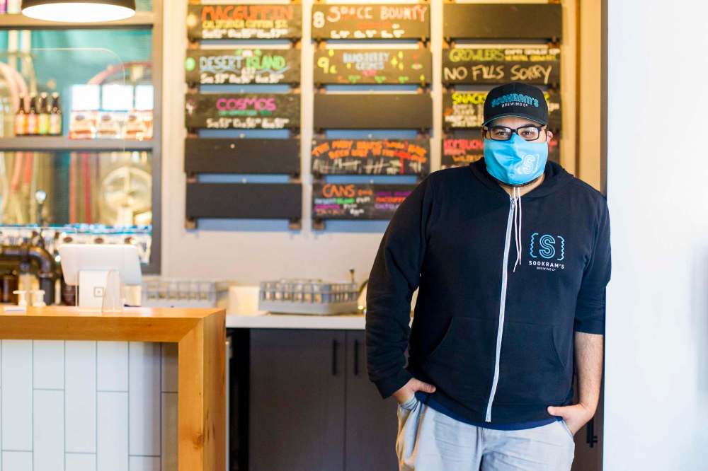 Andrew Sookram says the decision to mandate masks came out of conversations with staff about what made them feel the most safe and comfortable. (Mikaela MacKenzie / Winnipeg Free Press)