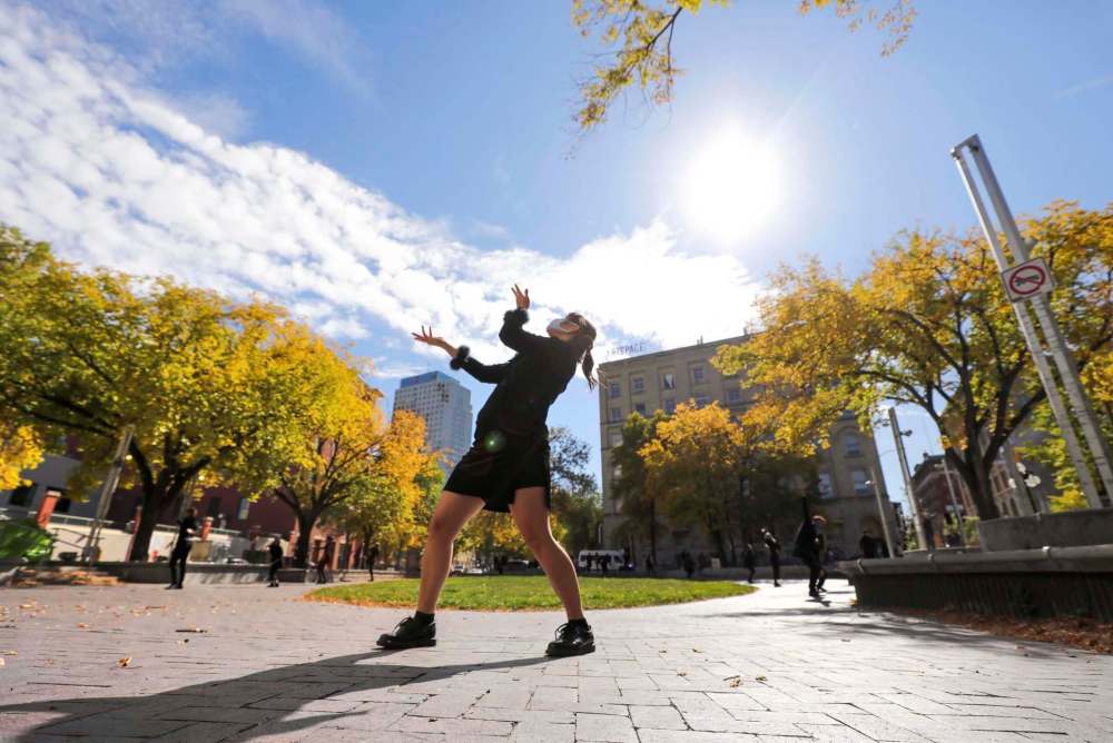 RUTH BONNEVILLE / WINNIPEG FREE PRESS
Dancers rehearse Landscape Dancing in Old Market Square last Thursday afternoon ahead of their Culture Days performance at St. Boniface Hospital on Friday.