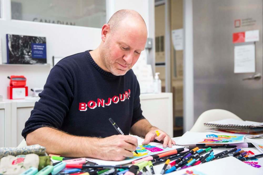 MIKAELA MACKENZIE / WINNIPEG FREE PRESS
Hasselriis works on his next comic, The Golden Boy in the Case of the Missing Cube.