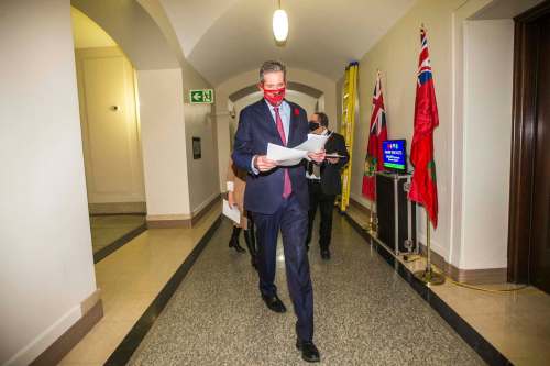 Premier Brian Pallister defended his decision to skip Friday's bad-news press conference by saying he didn't want to get in the way of public health officials on important announcements. (Mikaela MacKenzie / Winnipeg Free Press)