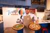 Tommy’s Pizzeria co-owner Thomas Schneider with a pair of pizzas — the Audrey Mayer (left, truffle mushroom) and the Nick Bean (margherita). (Mike Sudoma / Winnipeg Free Press)