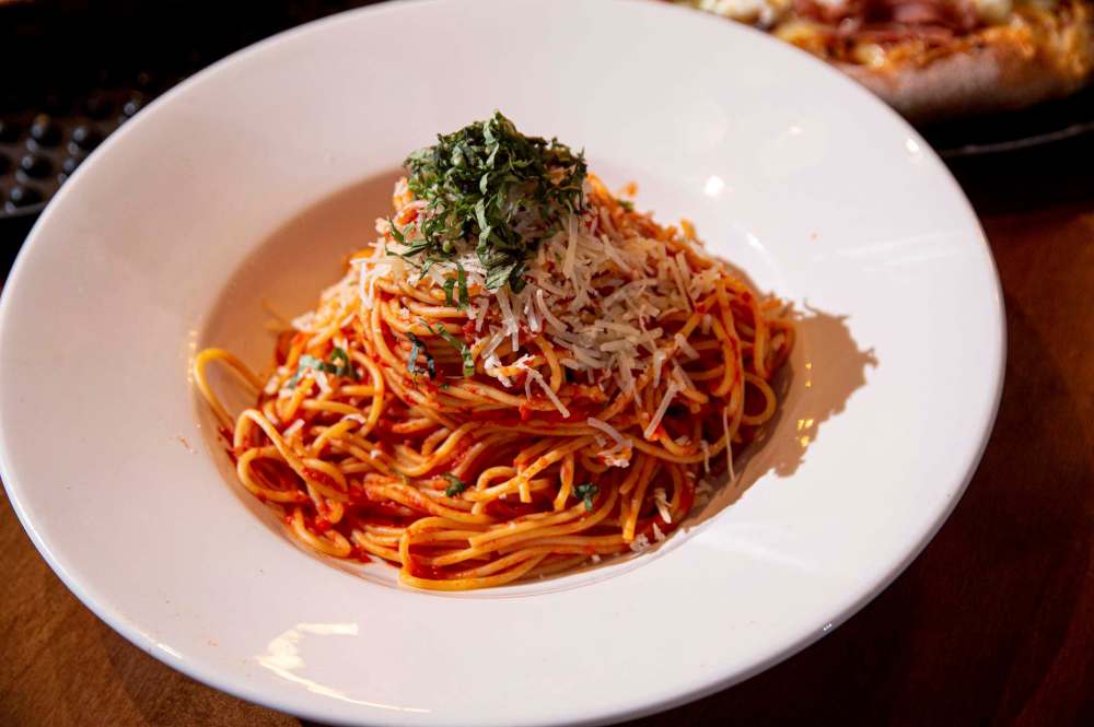 Tommy’s pasta: a serving of spaghetti with fresh tomato sauce and basil. (Mike Sudoma / Winnipeg Free Press)