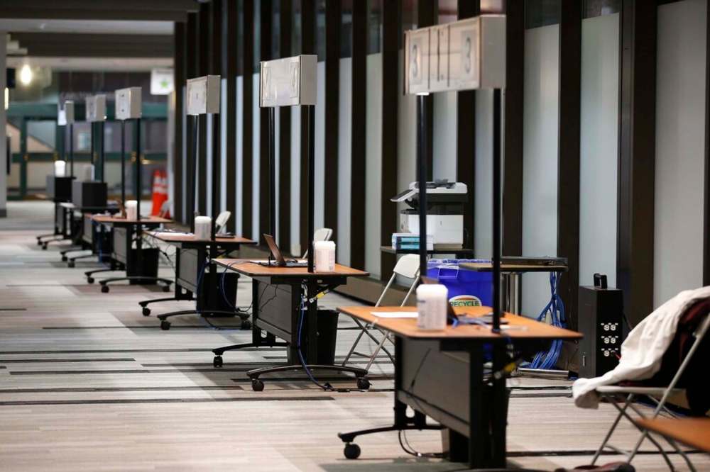 THE CANADIAN PRESS/John Woods
The COVID-19 vaccination site at the Convention Centre had only eight people administering injections Tuesday morning — the facility has 30 stations.