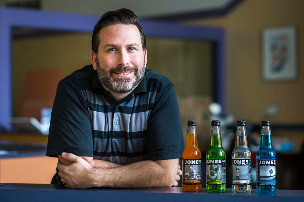 MIKAELA MACKENZIE / WINNIPEG FREE PRESS
Glen Zelinsky with bottles of Jones Soda featuring his photos on the labels. “The thought that somebody can go out and get my bottles is pretty cool.”