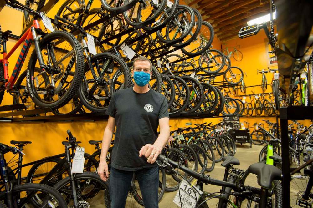 Tim Woodcock, owner of Woodcock Cycle Works, says his store is doing fine due to its strong online presence. ‘I do want to get back open, but we’re going to do it properly, on our time.’ (Mike Sudoma / Winnipeg Free Press)