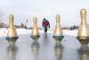 RUTH BONNEVILLE / WINNIPEG FREE PRESS
Jim Llewellyn, owner of Coronation Bowling Centre, throws a milk jug down the ice toward bowling pins. With his business closed due to pandemic restrictions, Llewellyn set up ice bowling lanes near his home in southeast Winnipeg.
