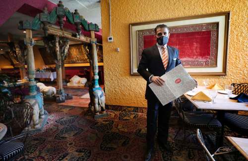RUTH BONNEVILLE / WINNIPEG FREE PRESS
Despite being limited to 25 per cent of the restaurant’s capacity under current health restrictions, East India Company owner Sachit Mehra called Sunday night 