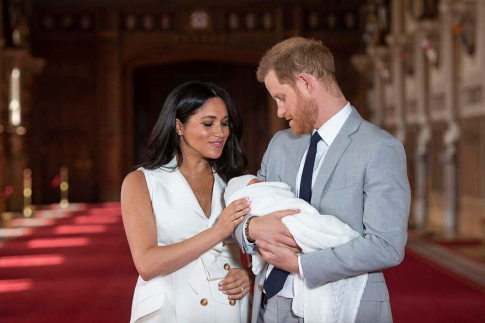 Britain's Prince Harry and Meghan, Duchess of Sussex, with their newborn son Archie in 2019. Is anyone really surprised by the claims of Prince Harry and Meghan, in an interview with Oprah Winfrey, that their son was denied a royal title, possibly because of the color of his skin? (Dominic Lipinski/Pool via AP, File)