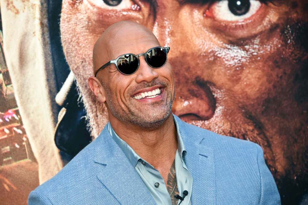 Dwayne (The Rock) Johnson fronts the XFL with his ex-wife and business partner, Dany Garcia, and they’re looking to join forces with the Canadian Football League. (File)