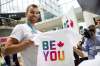 Canadian Press files
Winnipeg-born Olympic figure skater Eric Radford displays T-shirts for sale.