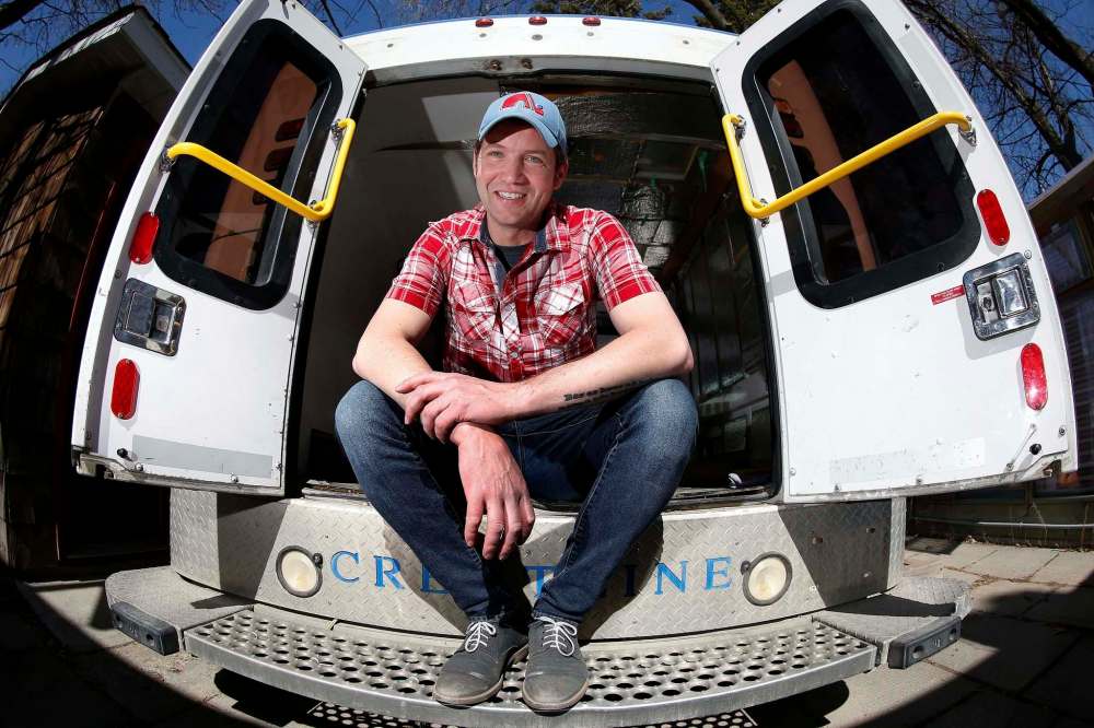 JOHN WOODS / WINNIPEG FREE PRESS
Joshua Vatnsdal, a local entrepreneur, prepares his decommissioned ambulance to become a delivery vehicle Sunday.