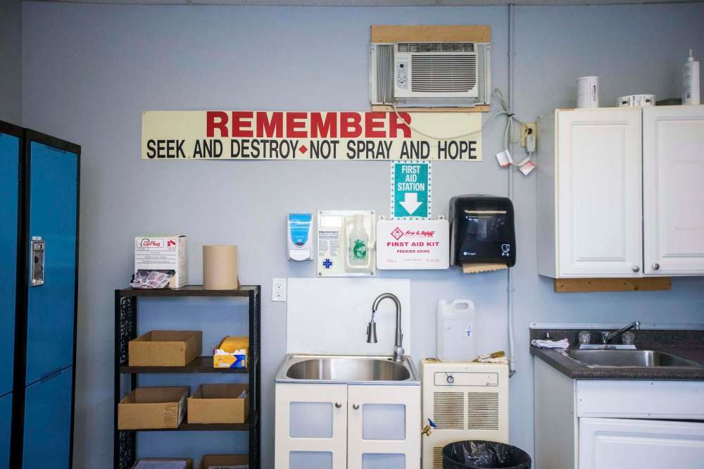 A sign in the break room reminds staff to maintain true vigil. (Mikaela MacKenzie / Winnipeg Free Press)