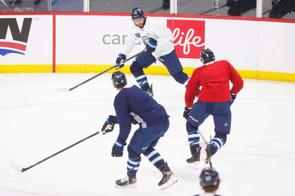 MIKE DEAL / WINNIPEG FREE PRESS
Wheeler suffered a concussion April 5 and was off skates for about five days before making incremental steps toward a return to the lineup.