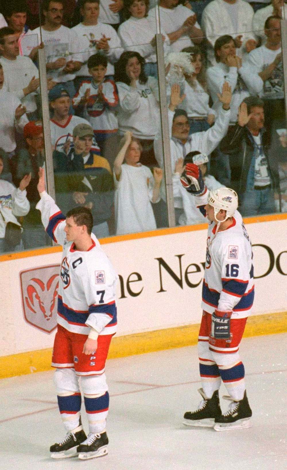 The Canadian Press files
Capitan Keith Tkachuck, left, and teammate Eddie Olczyk wave goodbye to the fans after losing the series to the Detroit Red Wings