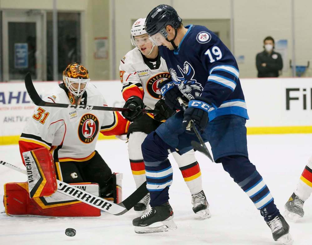 JOHN WOODS / WINNIPEG FREE PRESS
David Gustafsson of the Moose is stymied by Stockton Heat’s goaltie Andrew Shortridge. Gustafsson had the last laugh, bulging the twine for the game-winner in overtime.