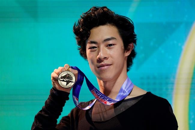 First-place finisher Nathan Chen poses with his medal in the men's championship at the U.S. Figure Skating Championships, Sunday, Jan. 17, 2021, in Las Vegas. (AP Photo/John Locher)