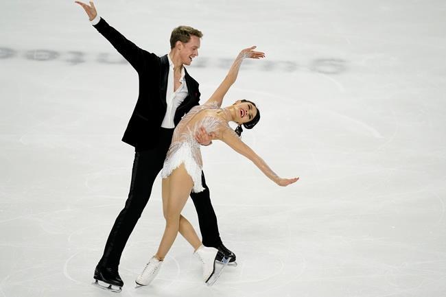 Madison Chock and Evan Bates perform during the rhythm dance program at the U.S. Figure Skating Championships, Friday, Jan. 15, 2021, in Las Vegas. (AP Photo/John Locher)