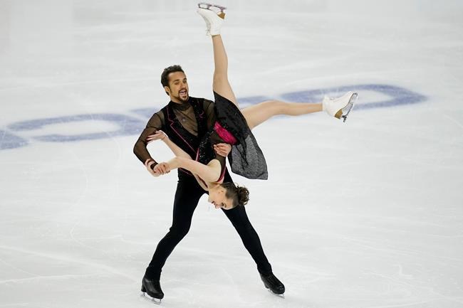Molly Cesanek and Yehor Yehorov perform during the rhythm dance program at the U.S. Figure Skating Championships, Friday, Jan. 15, 2021, in Las Vegas. (AP Photo/John Locher)