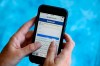 FILE - In this Aug. 21, 2018, file photo, a Facebook start page is shown on a smartphone in Surfside, Fla. Facebook says it's working to help limit the spread of misinformation and harmful content about the coronavirus and will focus on providing helpful information to people. Kang-Xing Jin, Facebook's head of health, said in a post, Friday, Jan. 31, 2020, that the social media platform's third-party fact-checkers are reviewing content and debunking false claims related to the coronavirus. (AP Photo/Wilfredo Lee, File)
