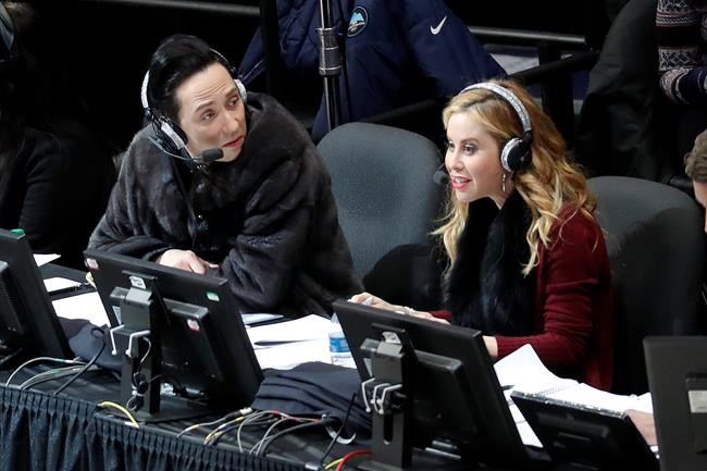 Announcers Johnny Weir and Tara Lipinski talk during the women's free skate program at the U.S. Figure Skating Championships in Detroit. Tara Lipinski, the 1998 Olympic gold medalist and now the top TV analyst in the sport along with NBC partner Johnny Weir, recognizes how jumbled the figure skating scene is. “The pre-Olympic season sets the tone of the Olympic season,” says Lipinski, who will anchor coverage of Skate America this week on NBC, NBCSN and the Peacock streaming service. (AP Photo/Paul Sancya, File)