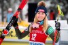 FILE - In this Dec. 7, 2019, file photo, second place finisher Mikaela Shiffrin, left, of the United States, celebrates following a women's World Cup downhill ski race in Lake Louise, Alberta. (Jeff McIntosh/The Canadian Press via AP, File)