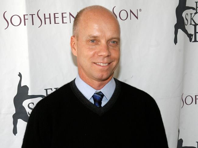 FILE - In this April 9, 2007, file photo, Olympic figure skating gold medalist Scott Hamilton arrives for Figure Skating In Harlem's annual gala