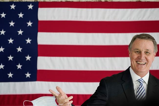 FILE - In this Oct. 13, 2020, file photo, Sen. David Perdue, R-Ga., speaks during a campaign event in Acworth, Ga. (AP Photo/Brynn Anderson, File)