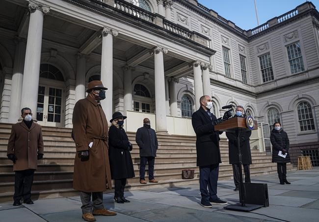 Congressman Hakeem Jeffries D-NY, third from right, speaks during a news conference at City Hall, Jan. 9, 2021, in New York. Members of New York's Congressional delegation and Mayor Bill de Blasio, second from right, called for swift impeachment of President Donald Trump following the violent siege of the U.S. Capitol by Trump supporters that left five dead. (AP Photo/Bebeto Matthews)