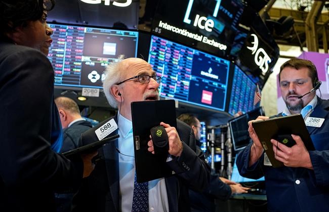 Trader Peter Tuchman works on the floor of the New York Stock Exchange Thursday, Feb. 27, 2020. (AP Photo/Craig Ruttle)