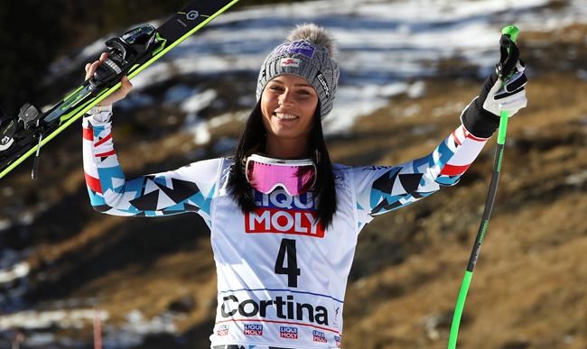 FILE - In this Jan. 29, 2017, file photo, Austria's Anna Veith celebrates her third place finish in the in the women's World Cup super-G ski race in Cortina d'Ampezzo, Italy. Veith, who twice returned to the top from serious knee injuries but called it a career a year after blowing out her knee for the third time, announced her retirement Saturday, May 23, 2020.(AP Photo/Alessandro Trovati, File)