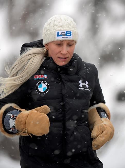 Kaillie Humphries, formerly of team Canada but now representing The United States, warms up a training run for the women's World Cup bobsled event in Lake Placid, N.Y., on Friday, Dec. 6, 2019. Competition begins on Saturday. (AP Photo/Hans Pennink)