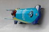 Driver Kaillie Humphries, and brakeman Lauren Gibbs of the United States take a turn during the first run of the women's bobsled World Cup race, in Lake Placid, N.Y., on Saturday, Dec. 14, 2019. (AP Photo/Hans Pennink)