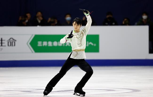 FILE - In this Sunday, Feb. 9, 2020 file photo, Gold medalist Japan's Yuzuru Hanyu performs during the men's single free skating competition in the ISU Four Continents Figure Skating Championships in Seoul, South Korea. As Nathan Chen seeks a third straight World Figure Skating Championships title, something no American has achieved since Scott Hamilton got his fourth in a row in 1984, he has two major challenges in front of him. One is two-time Olympic gold medalist Yuzuru Hanyu of Japan, who Chen calls “the benchmark.