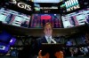 Trader Dudley Devine works on the floor of the New York Stock Exchange, Monday, March 9, 2020. The Dow Jones Industrial Average plummeted 1,500 points, or 6%, following similar drops in Europe after a fight among major crude-producing countries jolted investors already on edge about the widening fallout from the outbreak of the new coronavirus. (AP Photo/Richard Drew)
