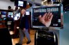 A trader passes a hand sanitizing station on the floor of the New York Stock Exchange, Tuesday, March 3, 2020. Federal Reserve Chairman Jerome Powell noted that the coronavirus 