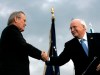 FILE - In this Dec. 15, 2006, file photo, outgoing Defense Secretary Donald H. Rumsfeld, left, shakes hands with Vice President Dick Cheney during an Armed Forces Full Honor Review for Rumsfeld at the Pentagon. All 10 living former secretaries of defense, including Rumsfeld and Cheney, have joined in cautioning against any attempt to use the military in the cause of overturning the November 2020 presidential election. (AP Photo/Pablo Martinez Monsivais, File)