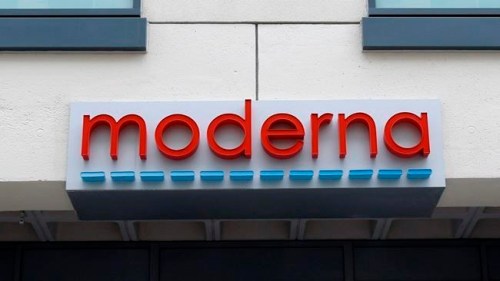 FILE - In this Monday, May 18, 2020, file photo, a sign marks an entrance to a Moderna, Inc., building, in Cambridge, Mass. Moderna said Monday, Nov. 16, 2020, its COVID-19 shot provides strong protection against the coronavirus that's surging in the U.S. and around the world. (AP Photo/Bill Sikes, File)