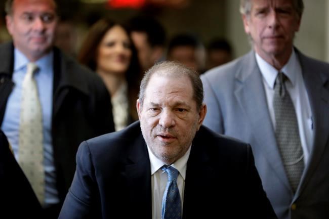 Harvey Weinstein arrives at a Manhattan courthouse as jury deliberations continue in his rape trial, Monday, Feb. 24, 2020, in New York. (AP Photo/Seth Wenig)