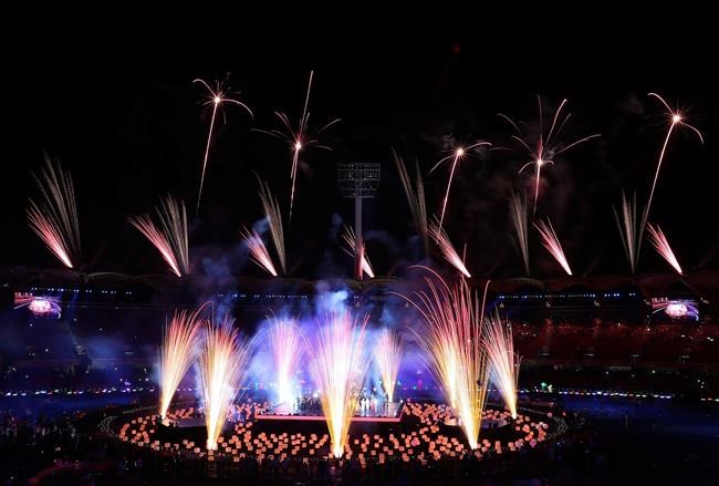 FILE - In this April 15, 2018, file photo, fireworks light up at Carrara Stadium during the closing ceremony of the 2018 Commonwealth Games on the Gold Coast, Australia. (AP Photo/Mark Schiefelbein, File)