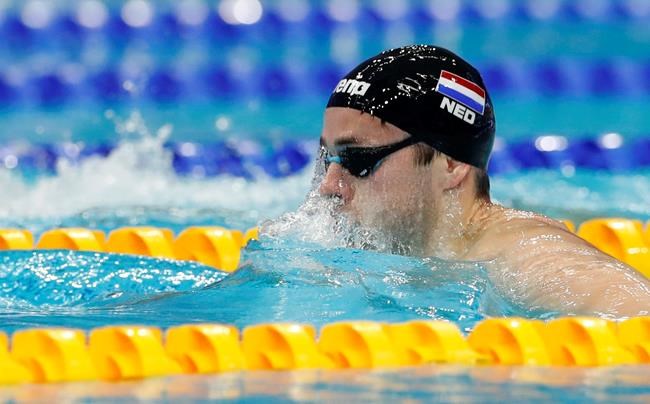 FILE - In this May 19, 2021, file photo, Arno Kamminga, of the Netherlands, competes during the men's 200-meters breaststroke preliminaries at the European Aquatics Championships in Duna Arena in Budapest, Hungary. Kamminga says he has the tactics to beat the most heavily favored swimmer at the Olympics: Adam Peaty. In May, Kamminga became the only man besides Peaty to break the 58-second barrier when he clocked 57.90 at the Dutch trials. (AP Photo/Petr David Josek, File)