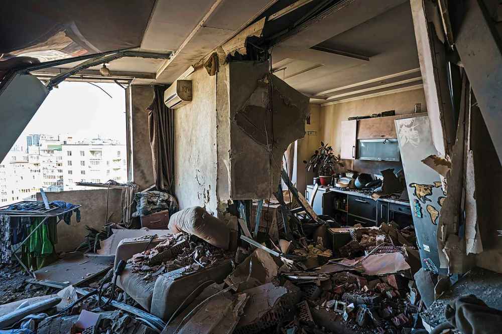 The aftermath of a rocket strike to a residential building in Kyiv, Ukraine, on Saturday, Feb. 26, 2022. (Marcus Yam/Los Angeles Times/TNS)