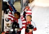 Kaillie Humphries, right, and Lauren Gibbs of the US celebrate after winning the two-woman bobsled competition at the Bobsleigh and Skeleton World Championships in Altenberg, Germany, Saturday, Feb. 22, 2020. (AP Photo/Jens Meyer)
