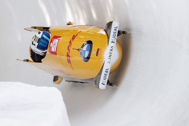 The Team Francesco Friedrich from Germany during the Men four Bob Sledge World Cup in St. Moritz, Switzerland, on Sunday, Feb. 2, 2020. (Urs Flueeler/Keystone via AP)